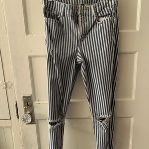 Striped ripped skinny jeans